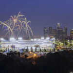 FIFA Finale TRANSFORMS: Super Bowl Spectacle! Fireworks above a brightly lit stadium at night with city skyline