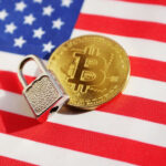 Bitcoin and padlock on American flag.