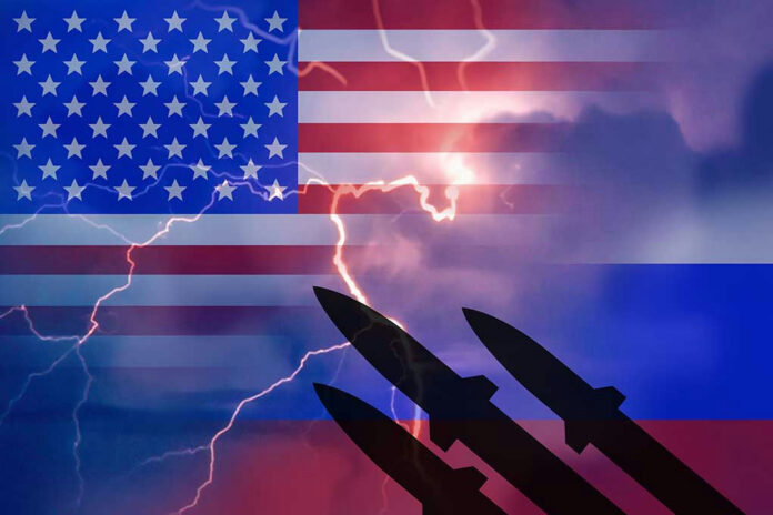 USA and Russia flags with missiles and lightning bolts.
