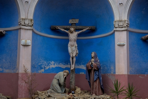 Ancient,Calvary,With,The,Powerful,And,Iconic,Representation,Of,The Sculptural depiction of the crucifixion with figures of Mary and John