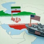 Map of Iran with Iranian and U.S. flags and a toy warship nearby
