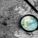 China’s Bold Launch Rattles Quiet Islands Map of China, Taiwan magnified, surrounded by pins, compass.