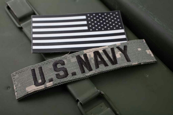 2277330471 U.S. Navy patch and monochrome American flag patch.