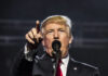 I dont know who this is person pointing during a speech.