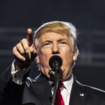 Trump Warns Iran After Assassination Threat I dont know who this is person pointing during a speech.