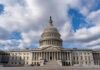 Congress Moves To Cement Trump’s Border Agenda United States Capitol building under a partly cloudy sky