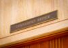 Governor's Office sign above a wooden doorway