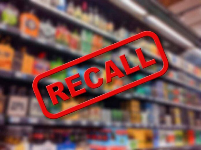 Recall notice over blurred store shelves.