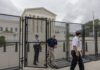 Security officials at the Supreme Court gates.